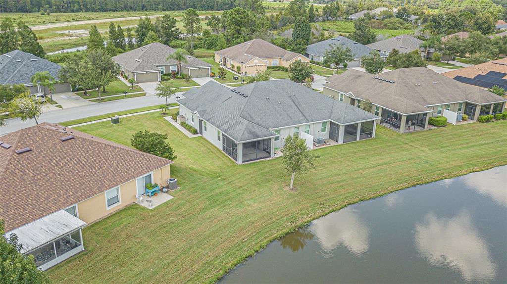 4256 Ashton Meadows Way Wesley Chapel, FL 33543 - Photo 40 of 42 an aerial view of a house with a yard