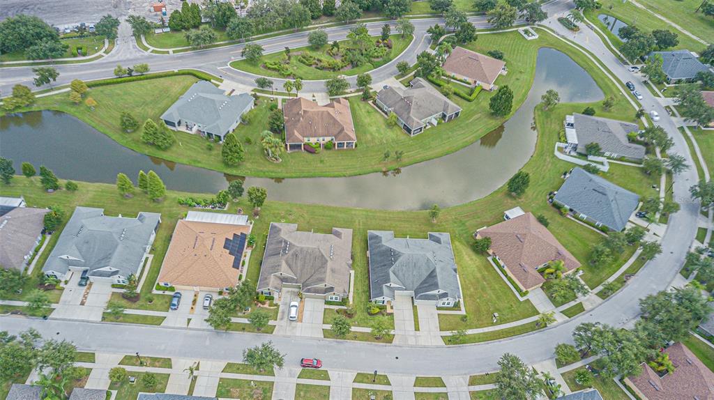 4256 Ashton Meadows Way Wesley Chapel, FL 33543 - Photo 41 of 42 an aerial view of houses with outdoor space