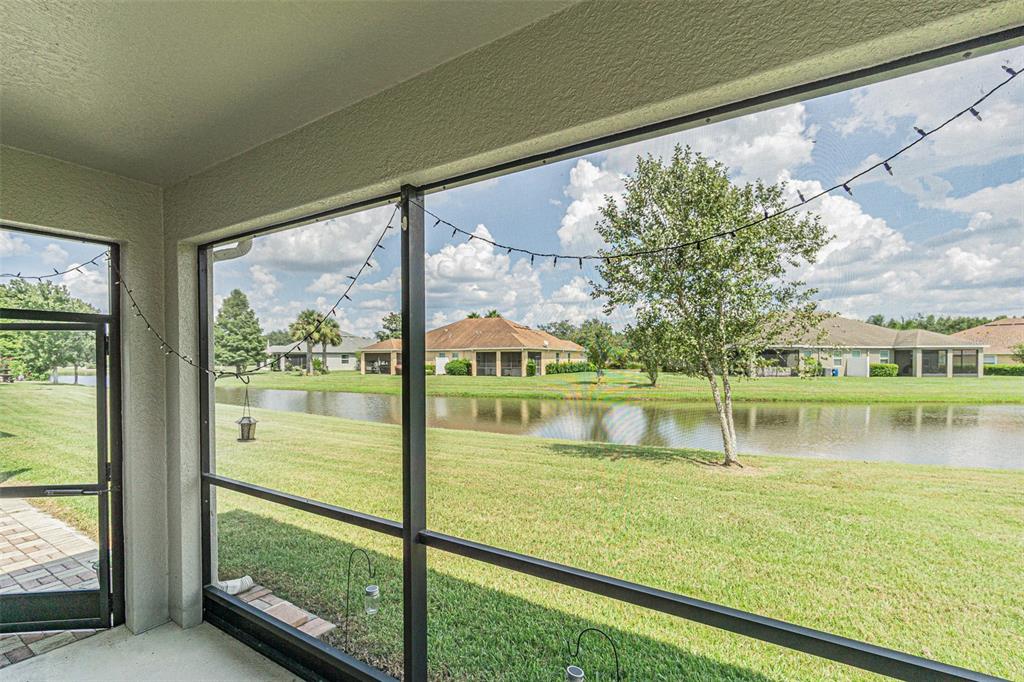4256 Ashton Meadows Way Wesley Chapel, FL 33543 - Photo 5 of 42 a view of lake from a window