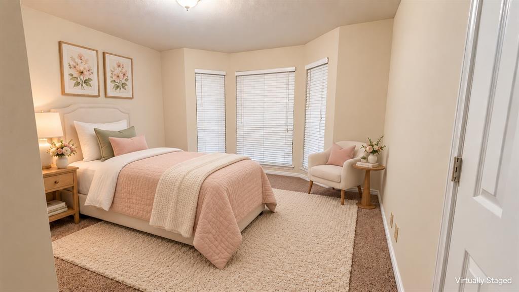 628 Raintree Circle Coppell, TX 75019 - Photo 24 of 30 Bedroom with Bay window