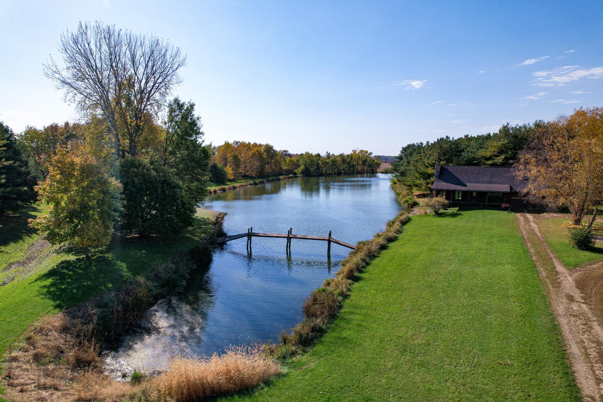 13582 West Springdale Road Forreston, IL 61030 - Photo 56 of 77 a view of a lake with outdoor space
