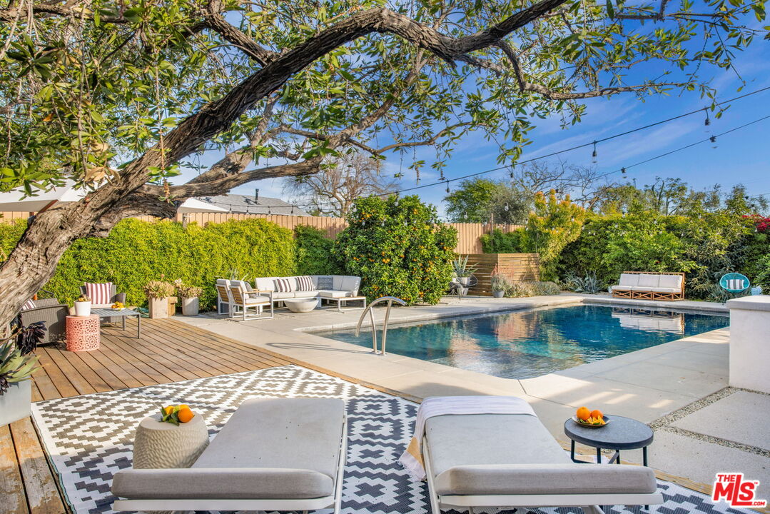 970 West Lehigh Street Altadena, CA 91001 - Photo 1 of 33 a view of a swimming pool with a patio and a yard