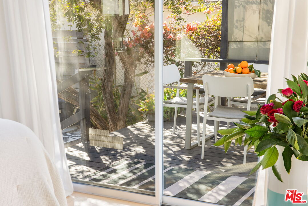 970 West Lehigh Street Altadena, CA 91001 - Photo 11 of 33 a dining room filled with furniture and a potted plant