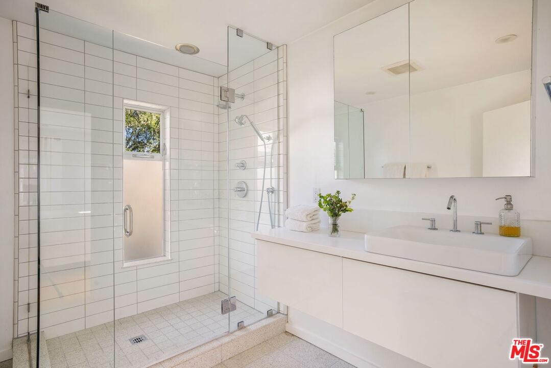 970 West Lehigh Street Altadena, CA 91001 - Photo 12 of 33 a bathroom with a shower sink and vanity