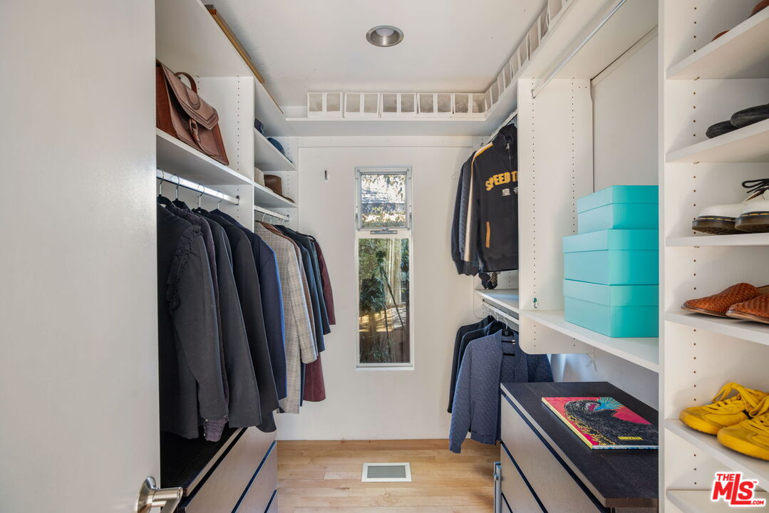 970 West Lehigh Street Altadena, CA 91001 - Photo 14 of 33 a view of walk in closet with clothes and shoes