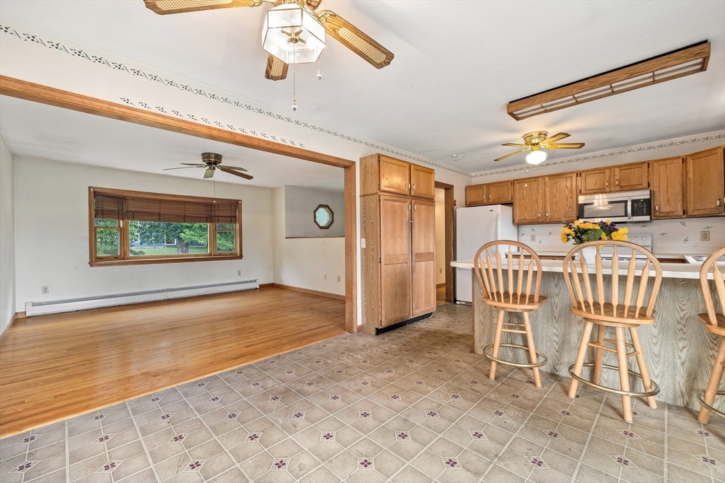 98 Fitzgerald Road Charlton, MA 01507 - Photo 4 of 27 a view of a livingroom with furniture and windows