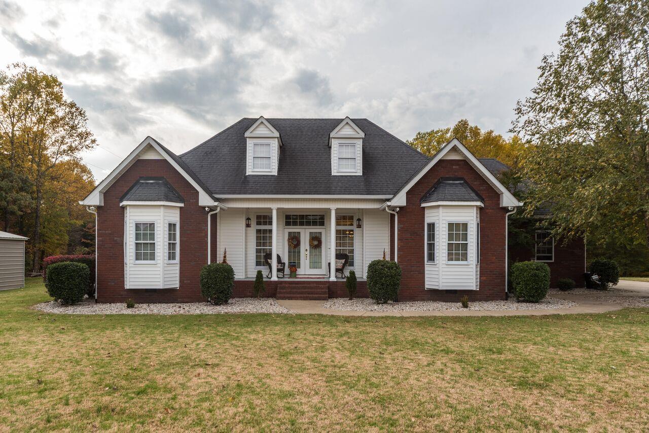 1105 North Corinth Road Portland, TN 37148 - Photo 2 of 16 a front view of a house with a yard