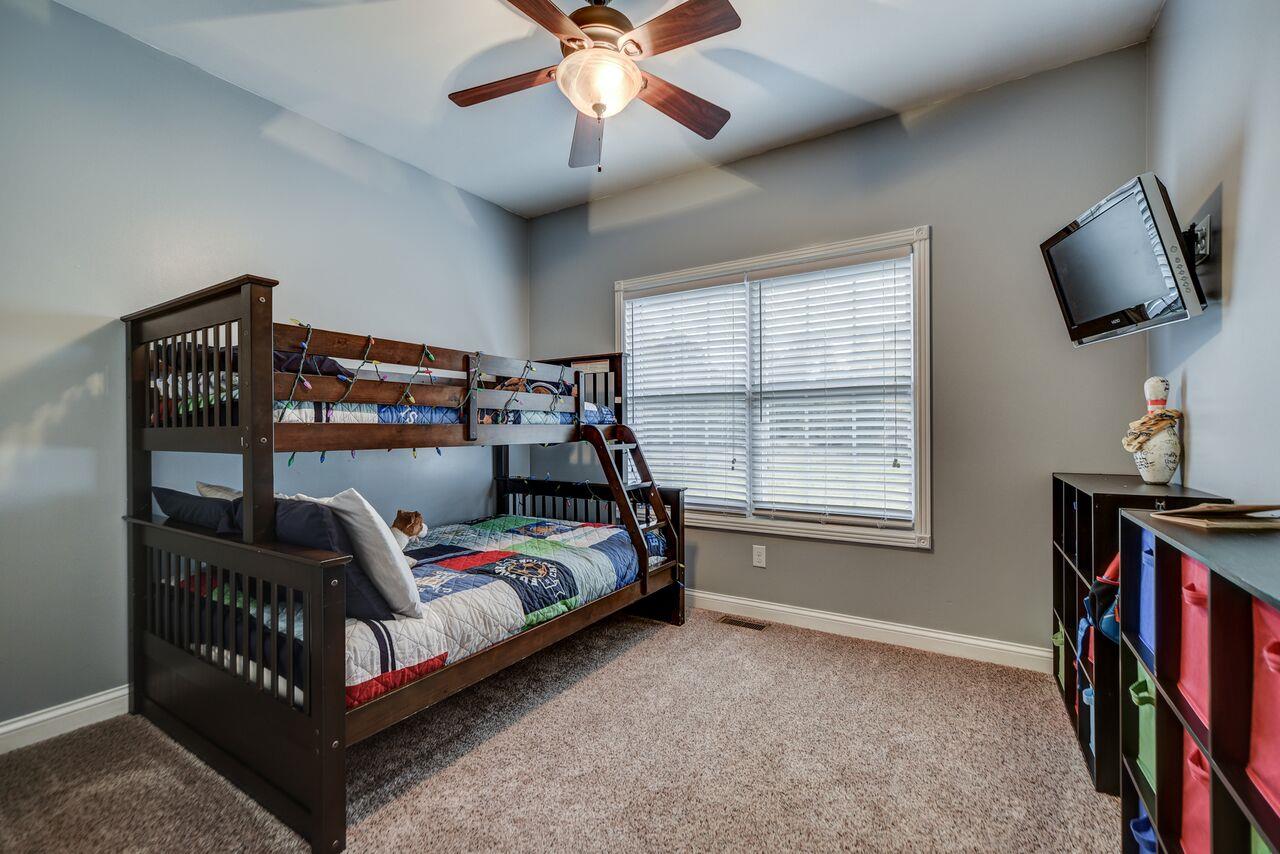 1105 North Corinth Road Portland, TN 37148 - Photo 8 of 16 a bedroom with furniture and a window