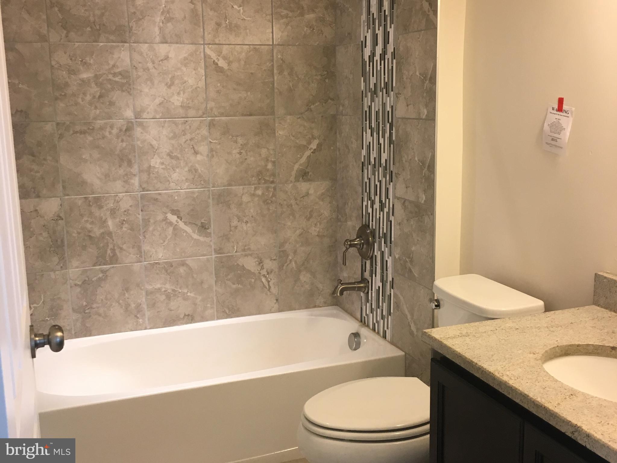 11463 Rawhide Road Lusby, MD 20657 - Photo 5 of 21 Main level bathroom
