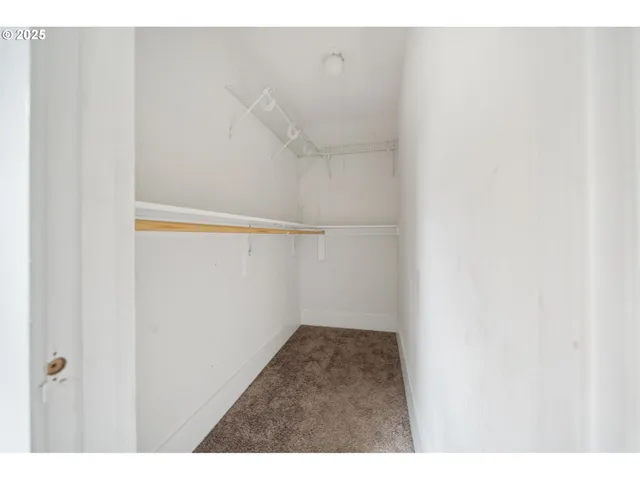 a view of small space with racks on the wall