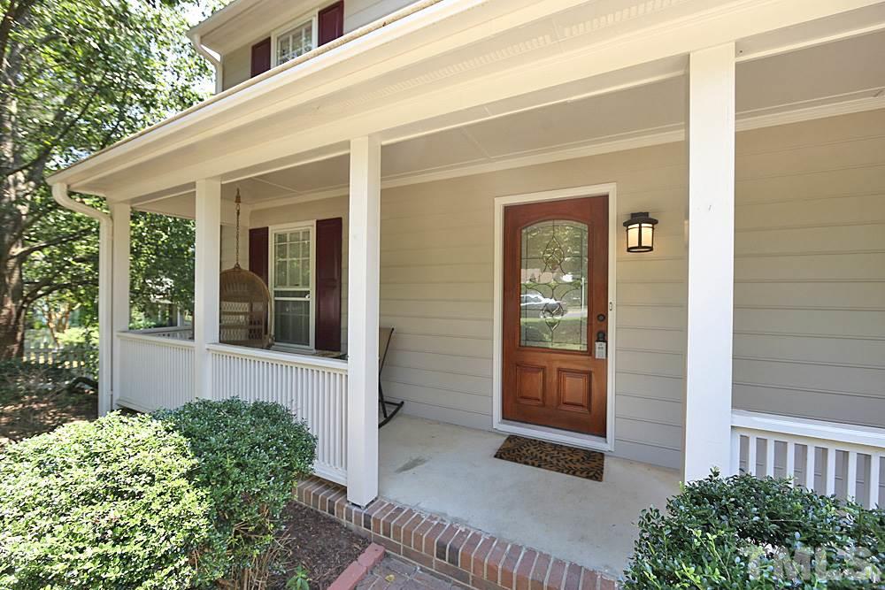 2204 Quail Ridge Road Raleigh, NC 27609 - Photo 2 of 25 a front view of a house with glass windows and door