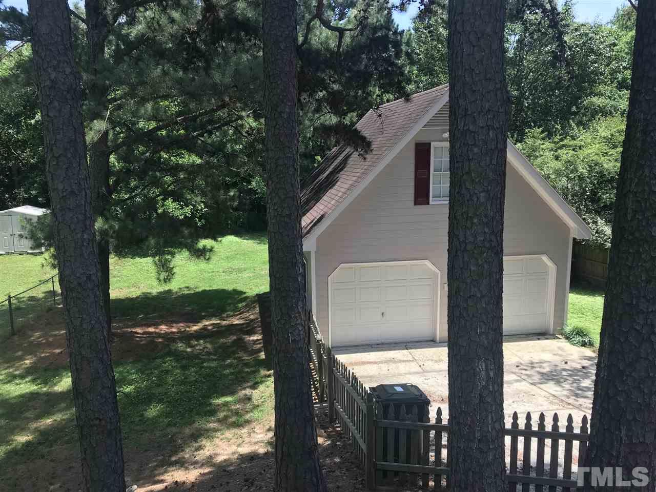 2204 Quail Ridge Road Raleigh, NC 27609 - Photo 25 of 25 a view of a porch with a tree