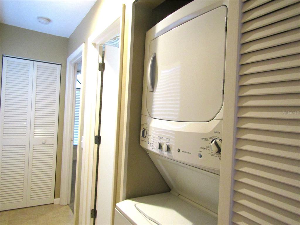 4521 Morningside, Unit 6 Sarasota, FL 34235 - Photo 12 of 22 a bathroom with a toilet and a mirror