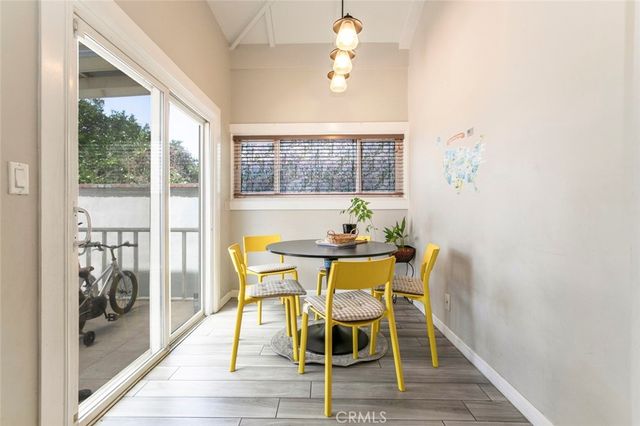 a bed room with a bed and a television