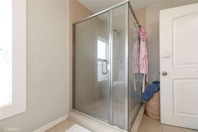 a view of a balcony with furniture