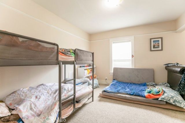 a front view of a house with a outdoor space