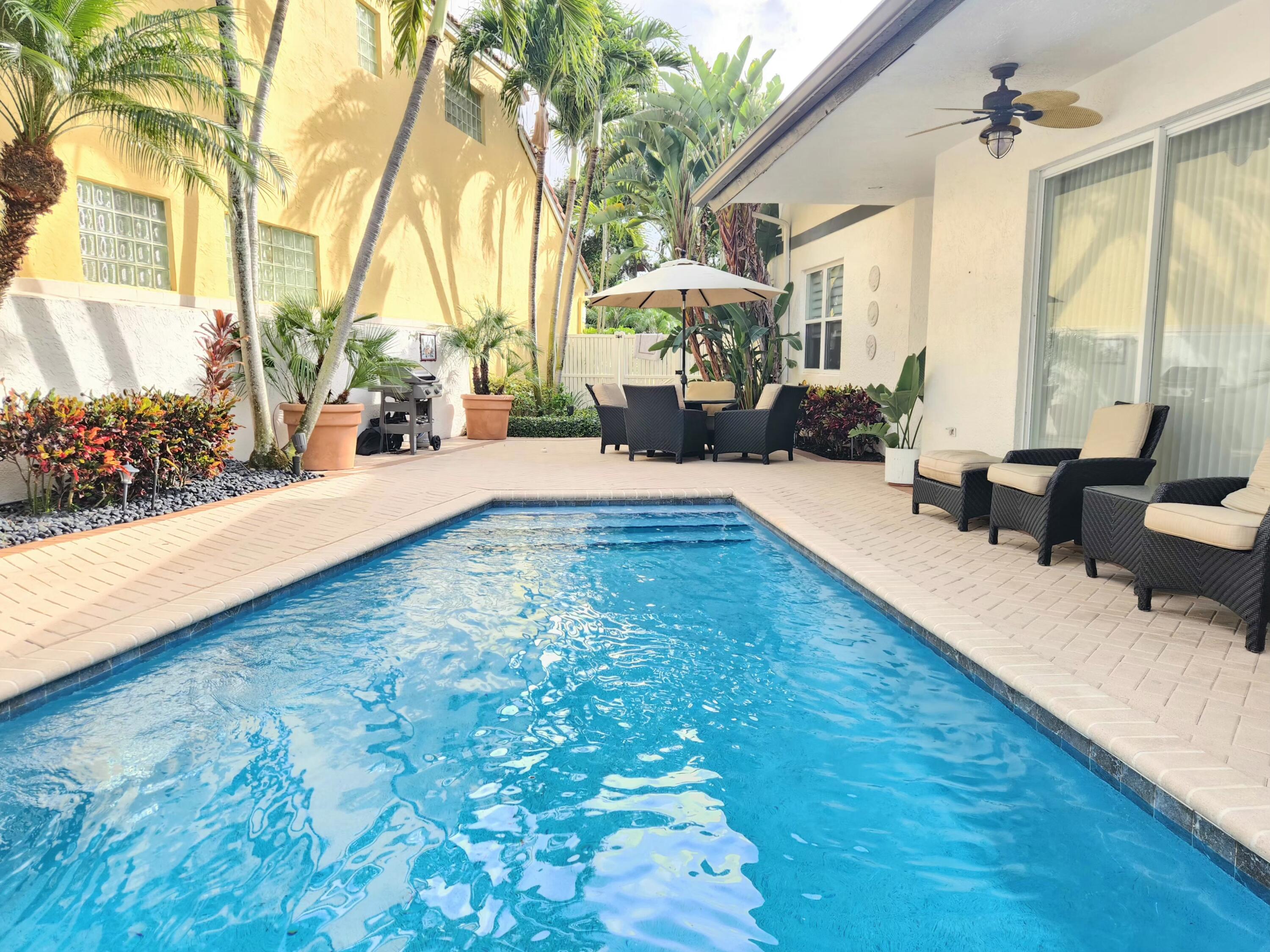 3567 Commodore Circle Delray Beach, FL 33483 - Photo 51 of 76 a view of outdoor space yard and patio
