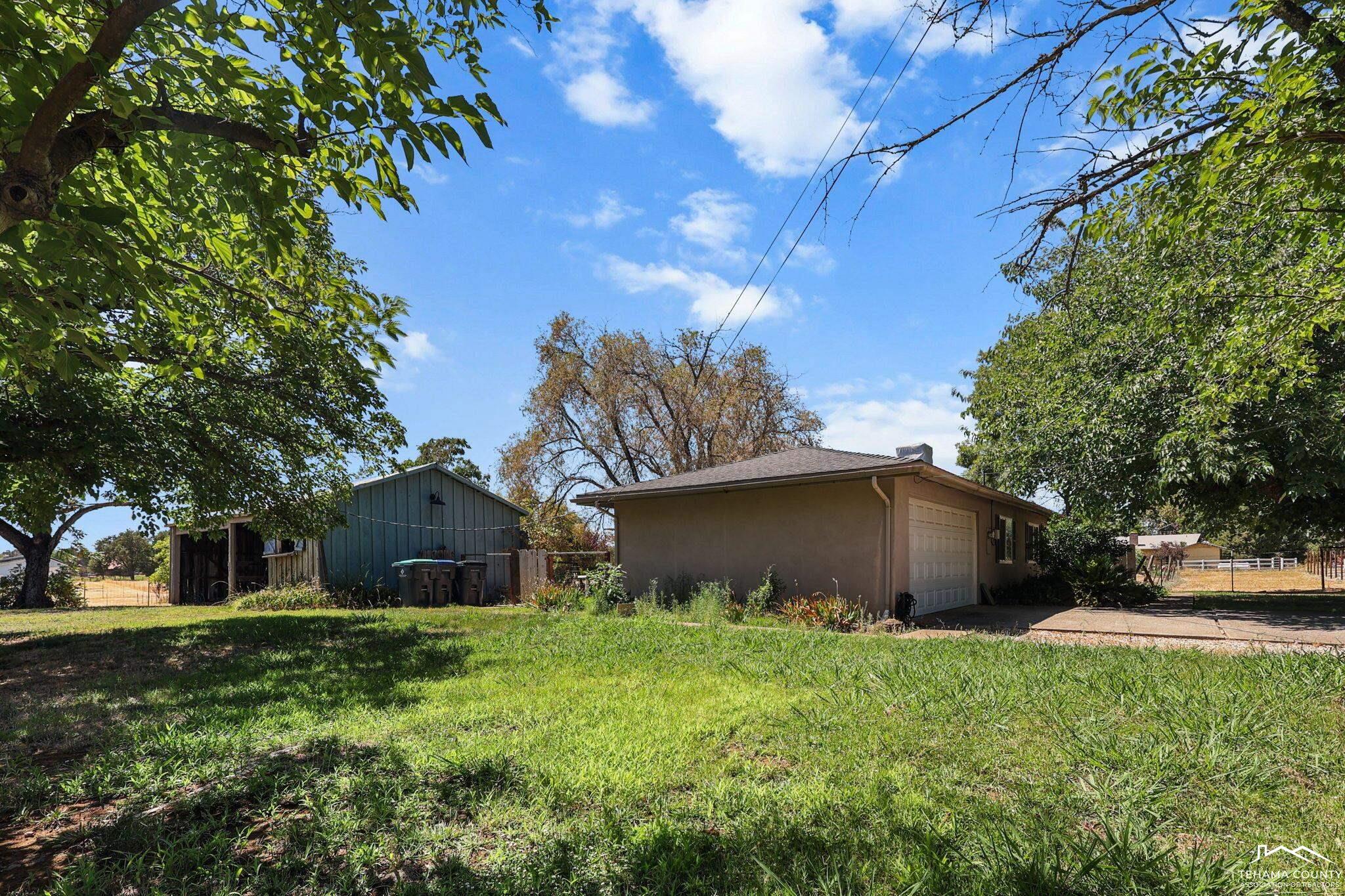 22275 Brent Road Red Bluff, CA 96080 - Photo 34 of 47 a front view of house with a garden