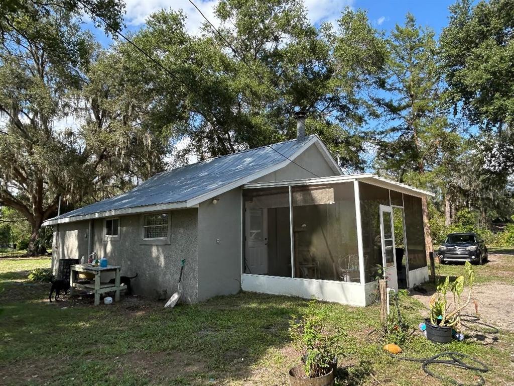 a view of a barn with a yard