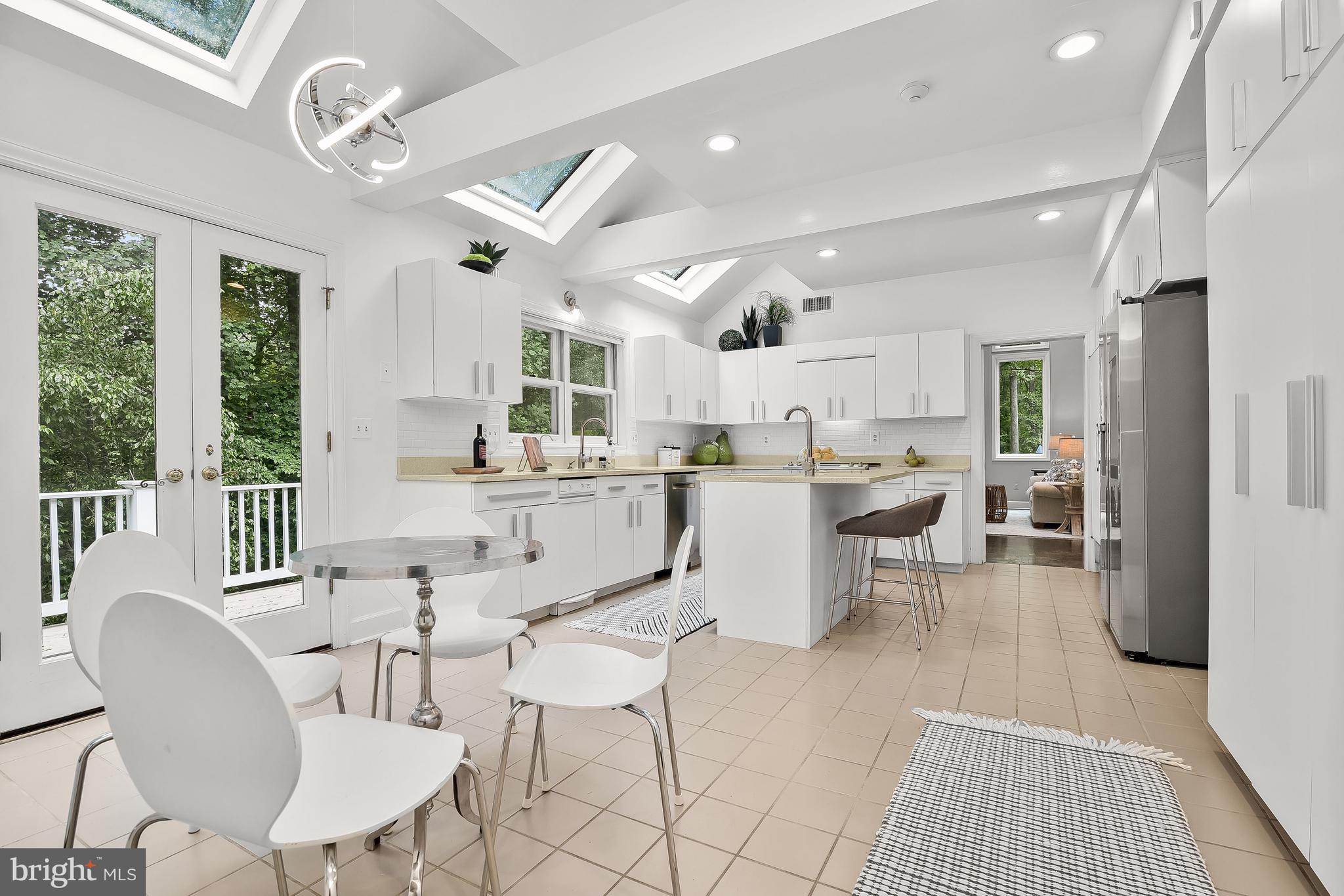 4240 Blue Barrow Ride Ellicott City, MD 21042 - Photo 22 of 86 Atrium Doors to Dining Deck