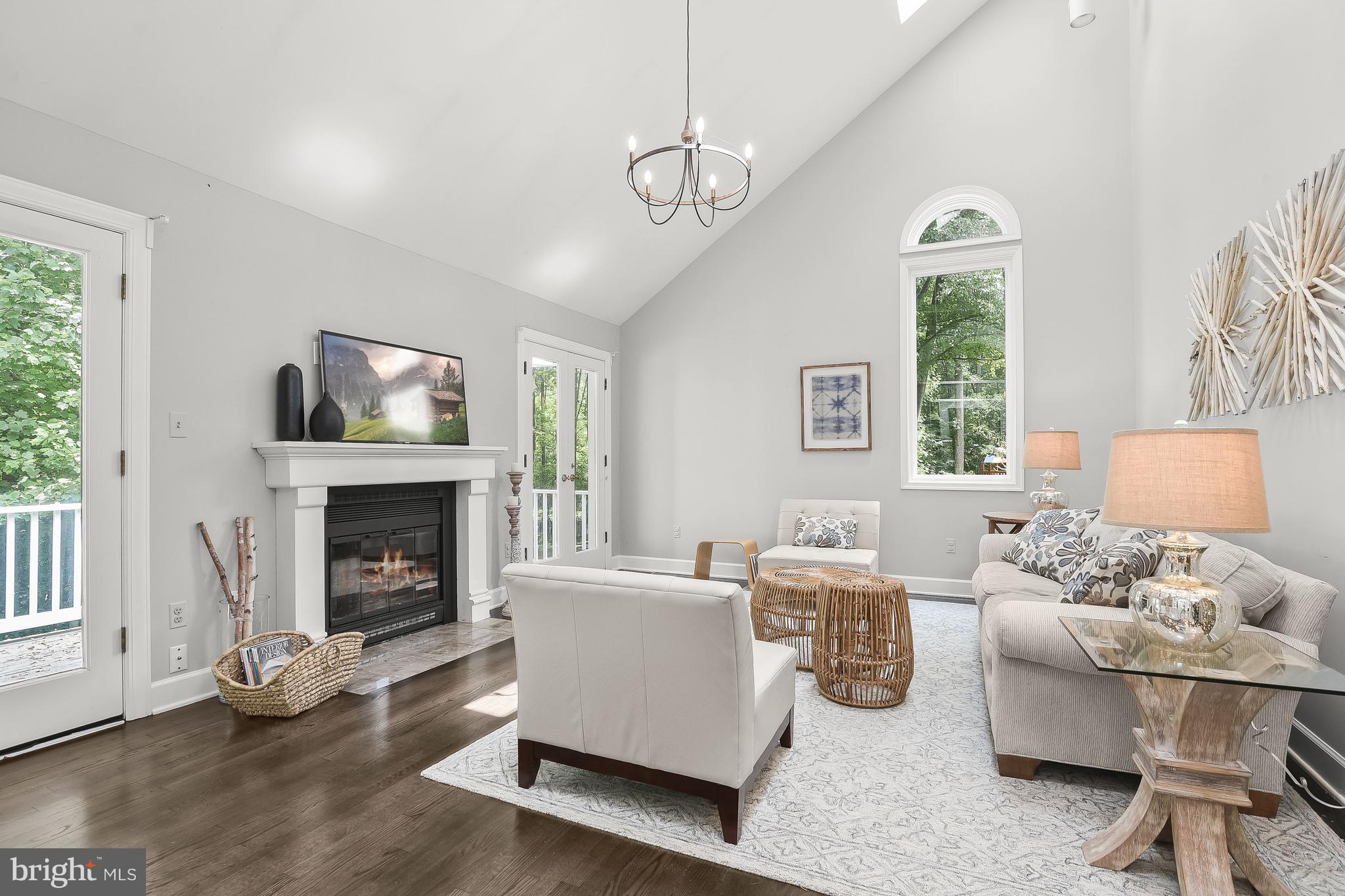 4240 Blue Barrow Ride Ellicott City, MD 21042 - Photo 33 of 86 Fireplace Sided by Atrium Doors to Deck