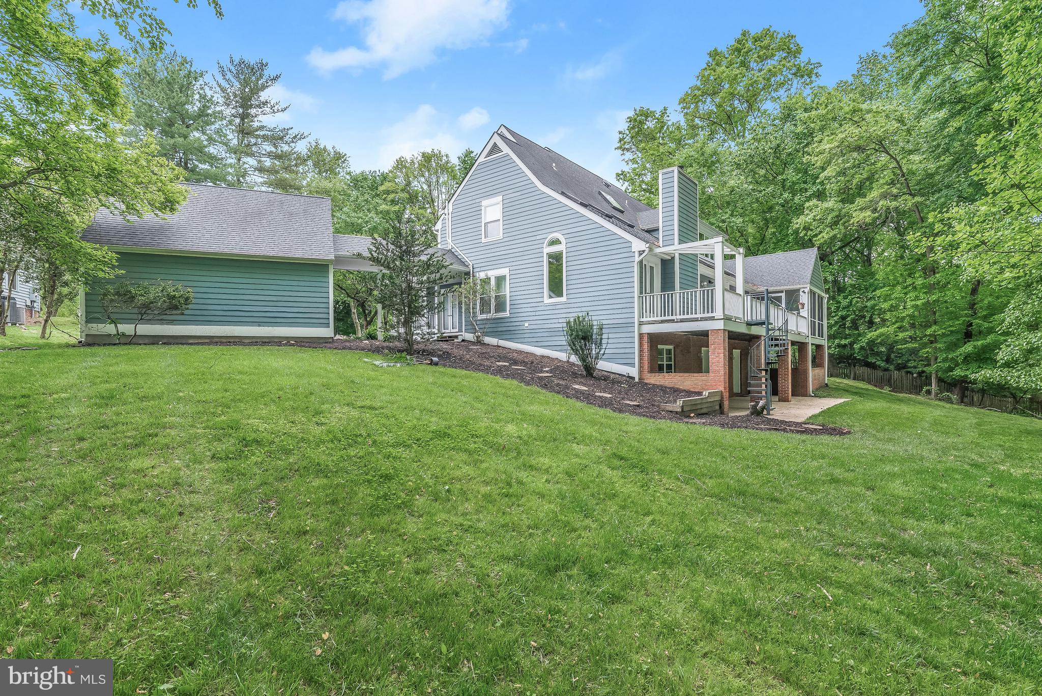 4240 Blue Barrow Ride Ellicott City, MD 21042 - Photo 79 of 86 Side Lawn & Breezeway to Garage