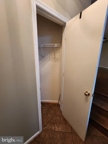 a bathroom with a sink a mirror and a toilet