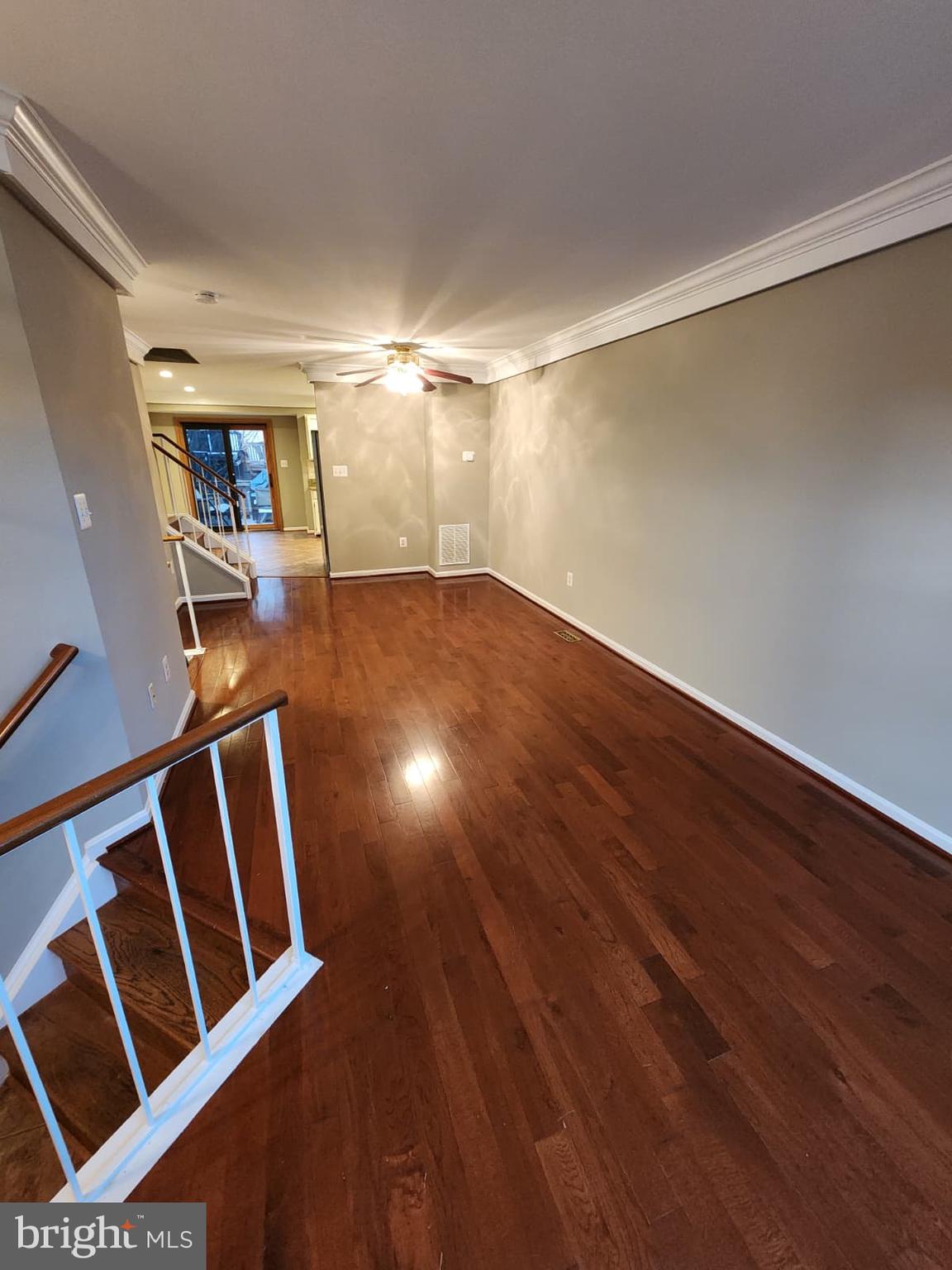 45033 Fellowship Square Ashburn, VA 20147 - Photo 14 of 37 a view of an empty room with wooden floor and a window