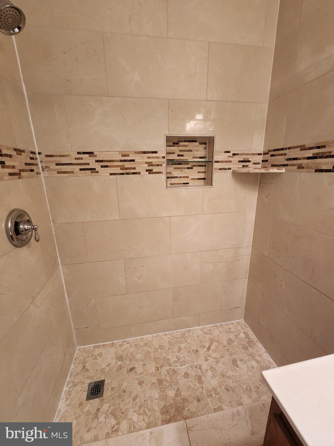 45033 Fellowship Square Ashburn, VA 20147 - Photo 16 of 37 a view of a bathroom with shower