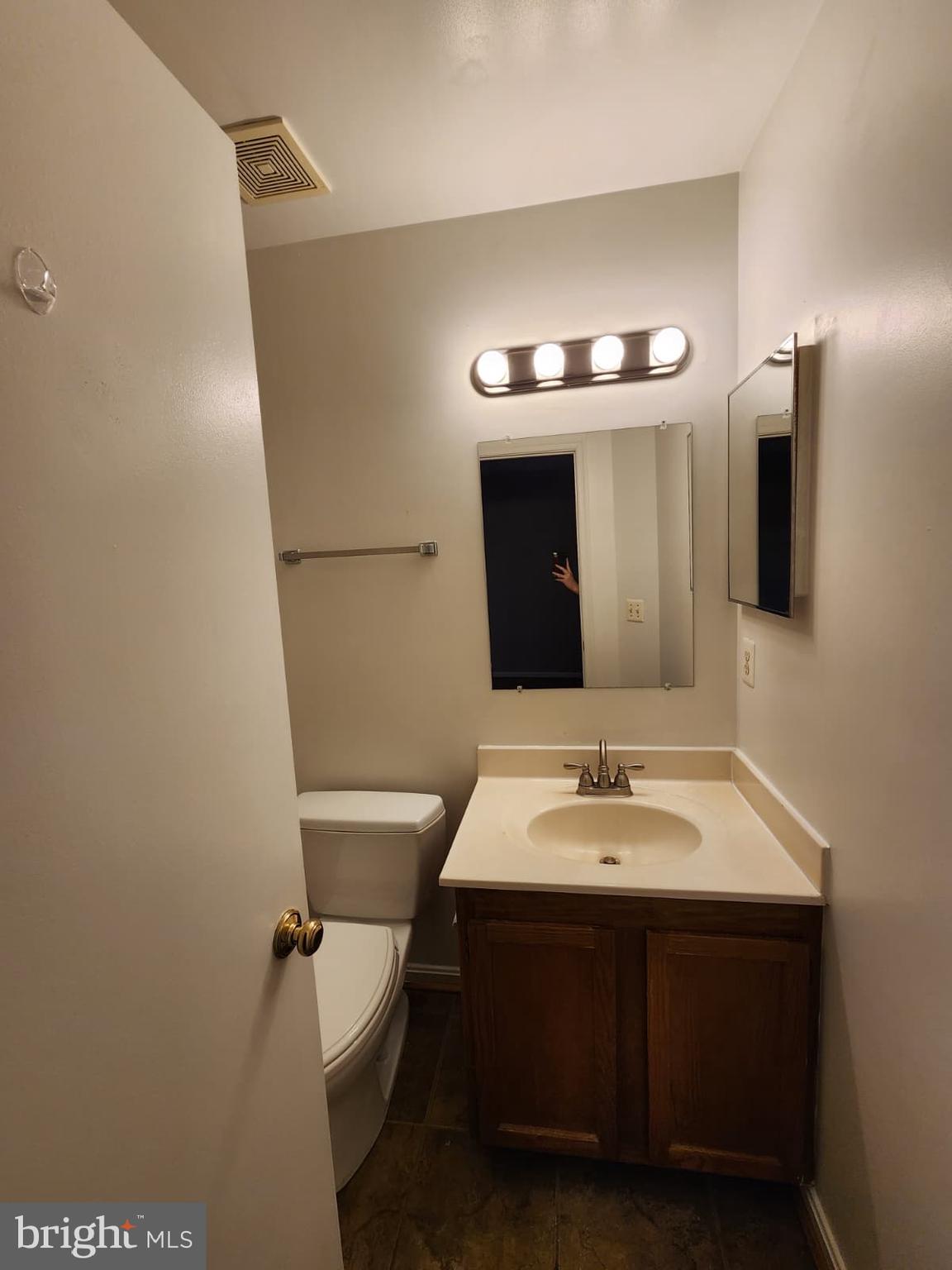 45033 Fellowship Square Ashburn, VA 20147 - Photo 23 of 37 a bathroom with a sink and a mirror