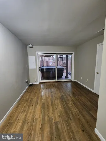 a view of a house with a large window and stairs