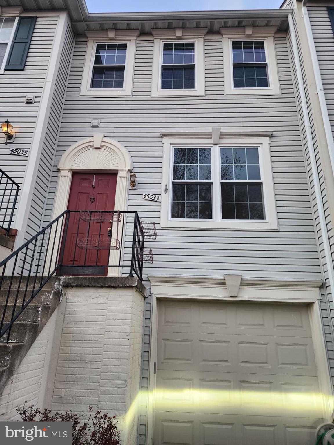 45033 Fellowship Square Ashburn, VA 20147 - Photo 6 of 37 a view of a house with a door