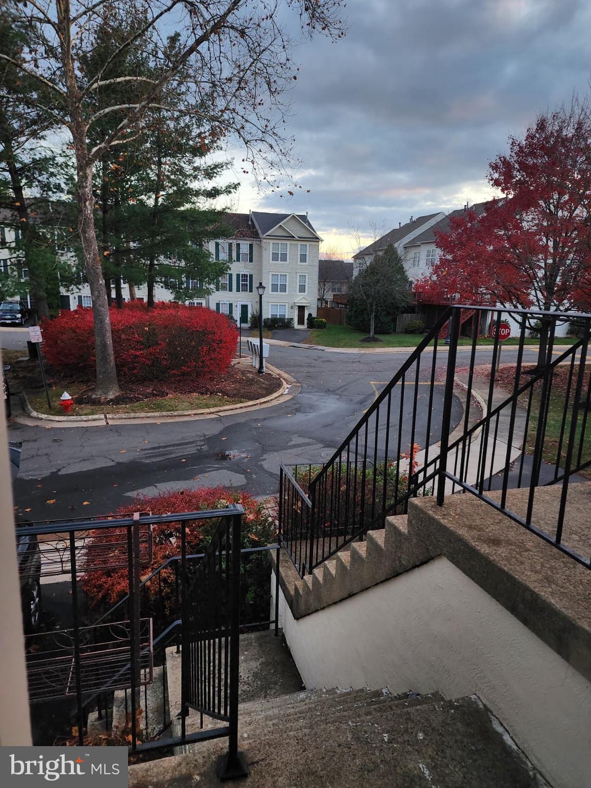 45033 Fellowship Square Ashburn, VA 20147 - Photo 7 of 37 a view of a porch with furniture and a yard