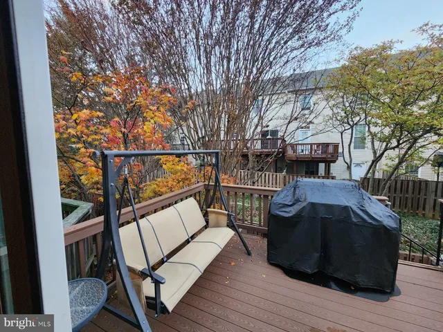 a view of a house with a door and wooden door