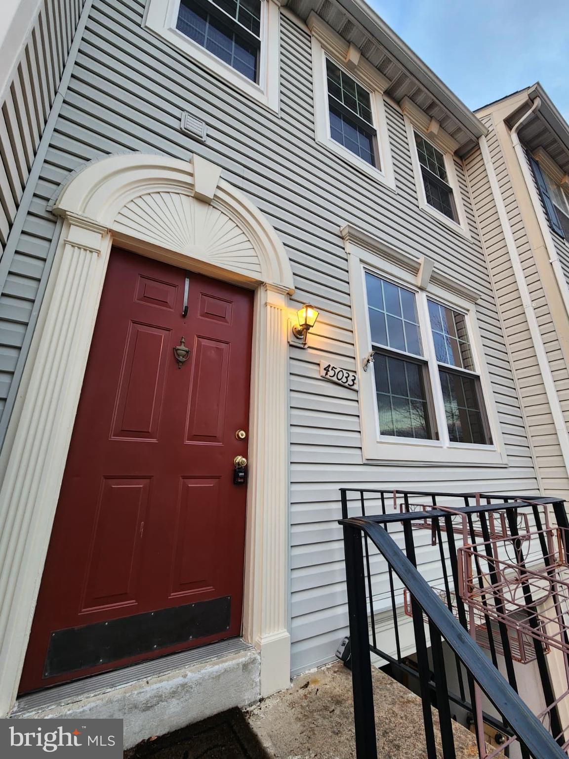 45033 Fellowship Square Ashburn, VA 20147 - Photo 10 of 37 a view of a house with a door and wooden door
