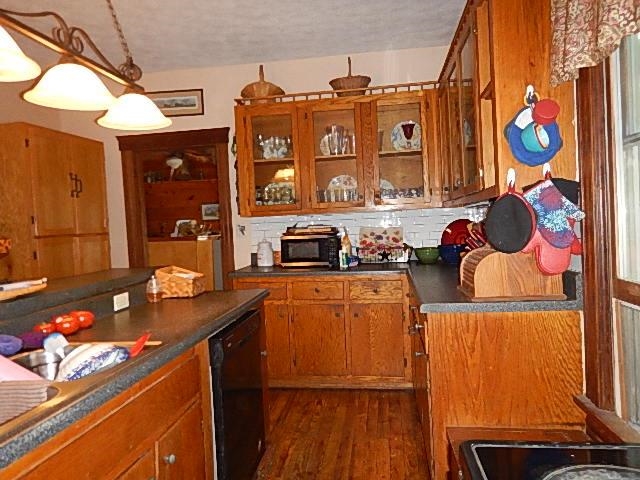 1312 Raphine Road Raphine, VA 24472 - Photo 14 of 30 a kitchen with stainless steel appliances granite countertop a stove and a dining table