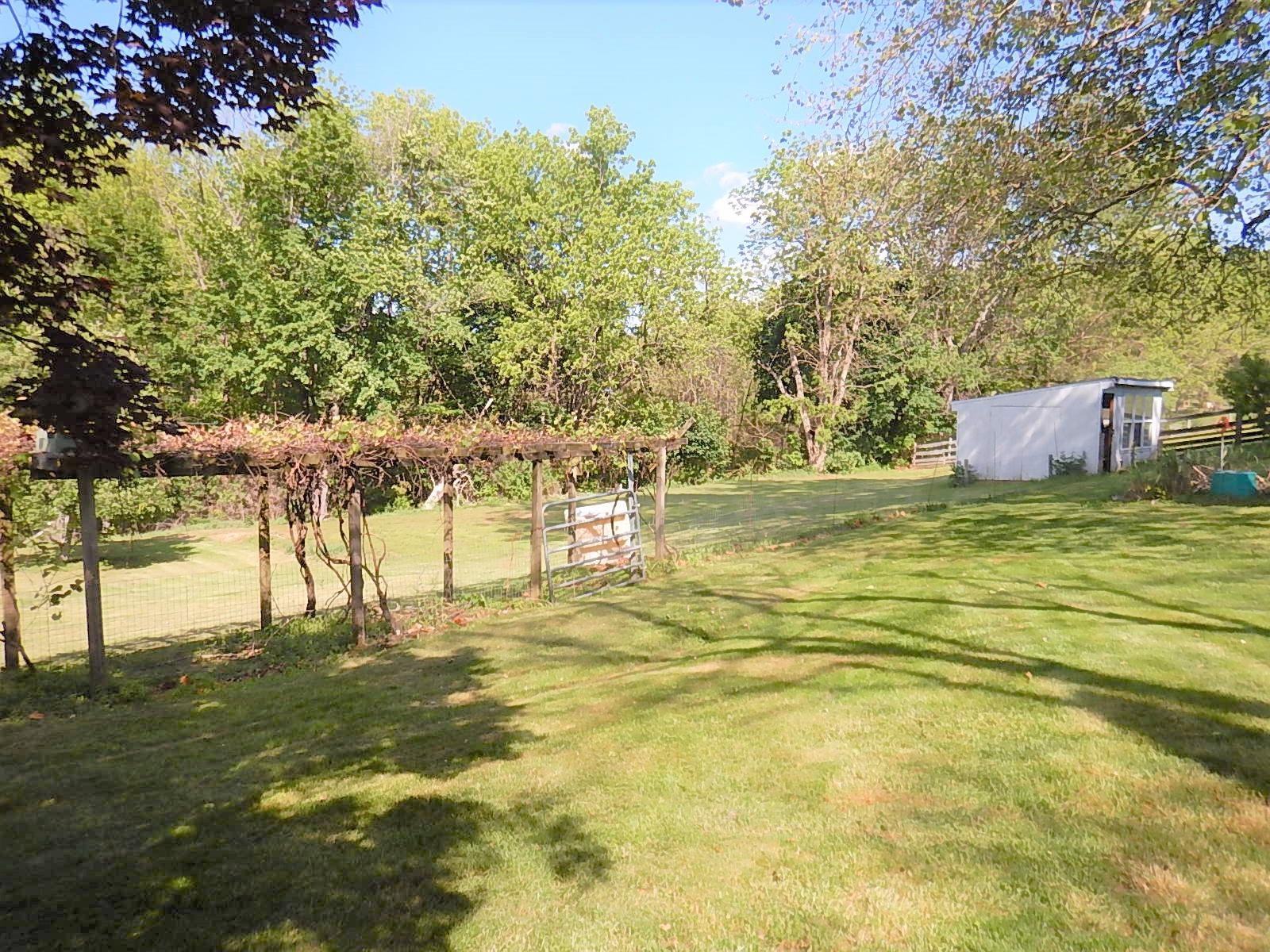 1312 Raphine Road Raphine, VA 24472 - Photo 27 of 30 a view of a swimming pool with an outdoor space and seating area