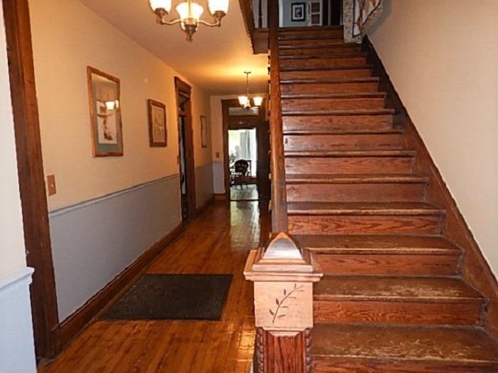 1312 Raphine Road Raphine, VA 24472 - Photo 5 of 30 a view of entryway and hall with wooden floor