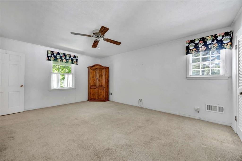 103 Gabriel Way Social Circle, GA 30025 - Photo 41 of 70 a view of an empty room with a window