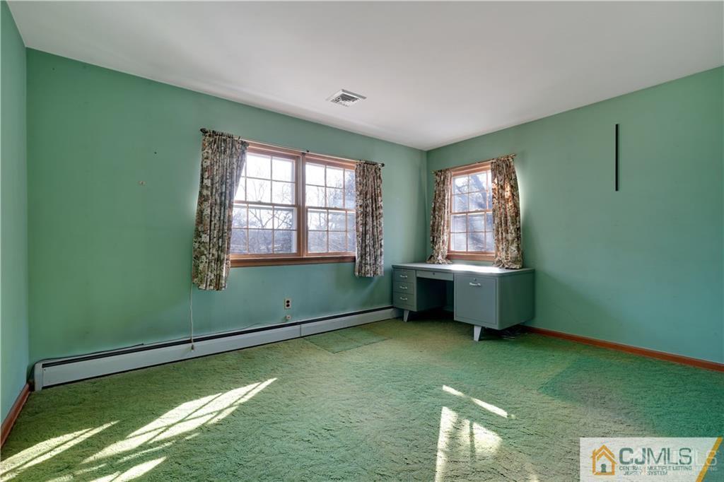 124 Sunset Road Belle Mead, NJ 08502 - Photo 18 of 29 a room with window