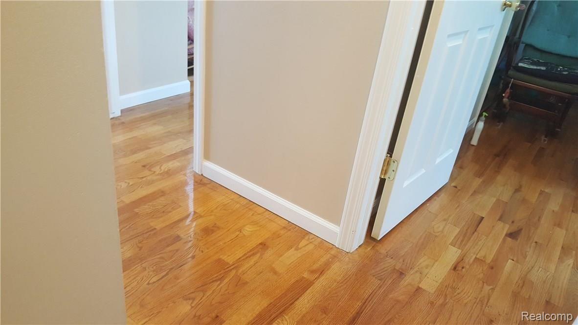 15719 Springhill Street Romulus, MI 48174 - Photo 17 of 20 Hardwood floors thru-out 2nd floor.