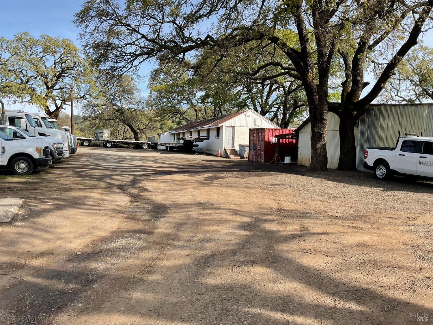 4060 Monticello Road Napa, CA 94558 - Photo 46 of 54 a view of a large house with a large tree in front of it