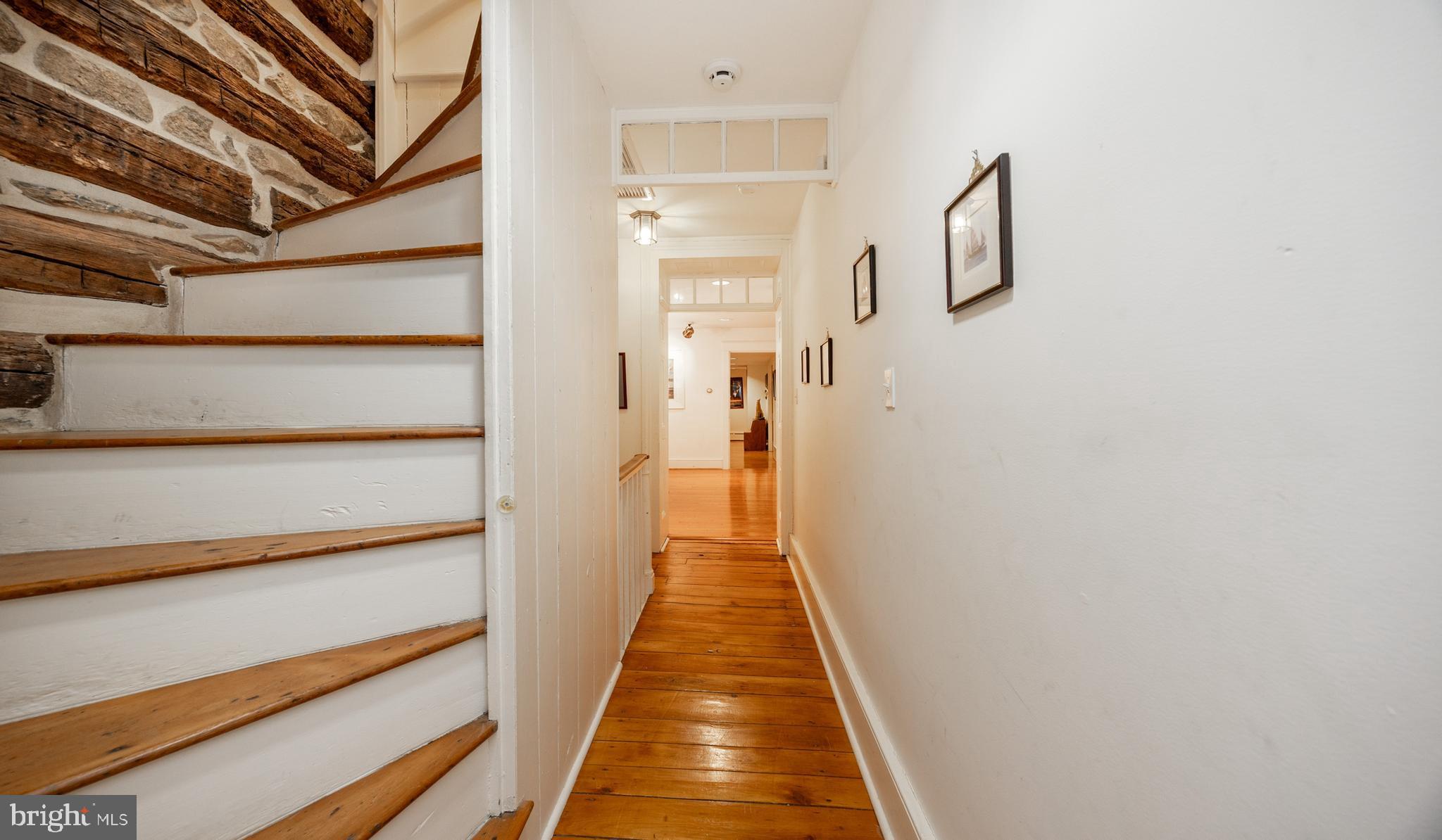 580 Reeds Road Downingtown, PA 19335 - Photo 18 of 82 a view of a hallway with wooden floor and staircase