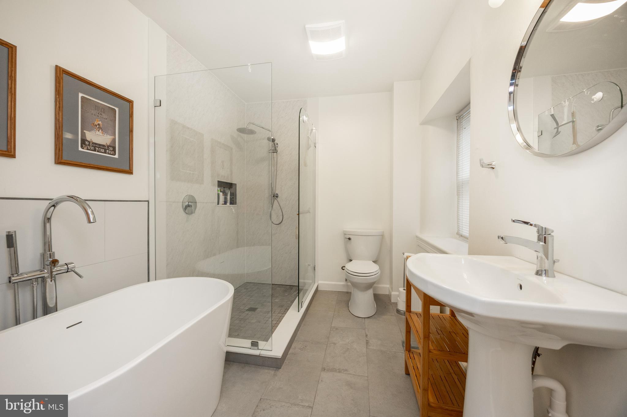 580 Reeds Road Downingtown, PA 19335 - Photo 26 of 82 a bathroom with a sink a toilet and shower