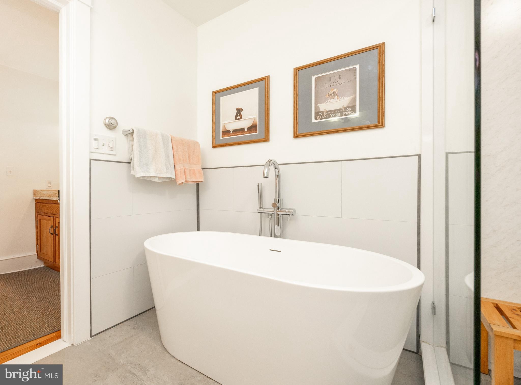 580 Reeds Road Downingtown, PA 19335 - Photo 27 of 82 a white bath tub sitting next to a bathroom