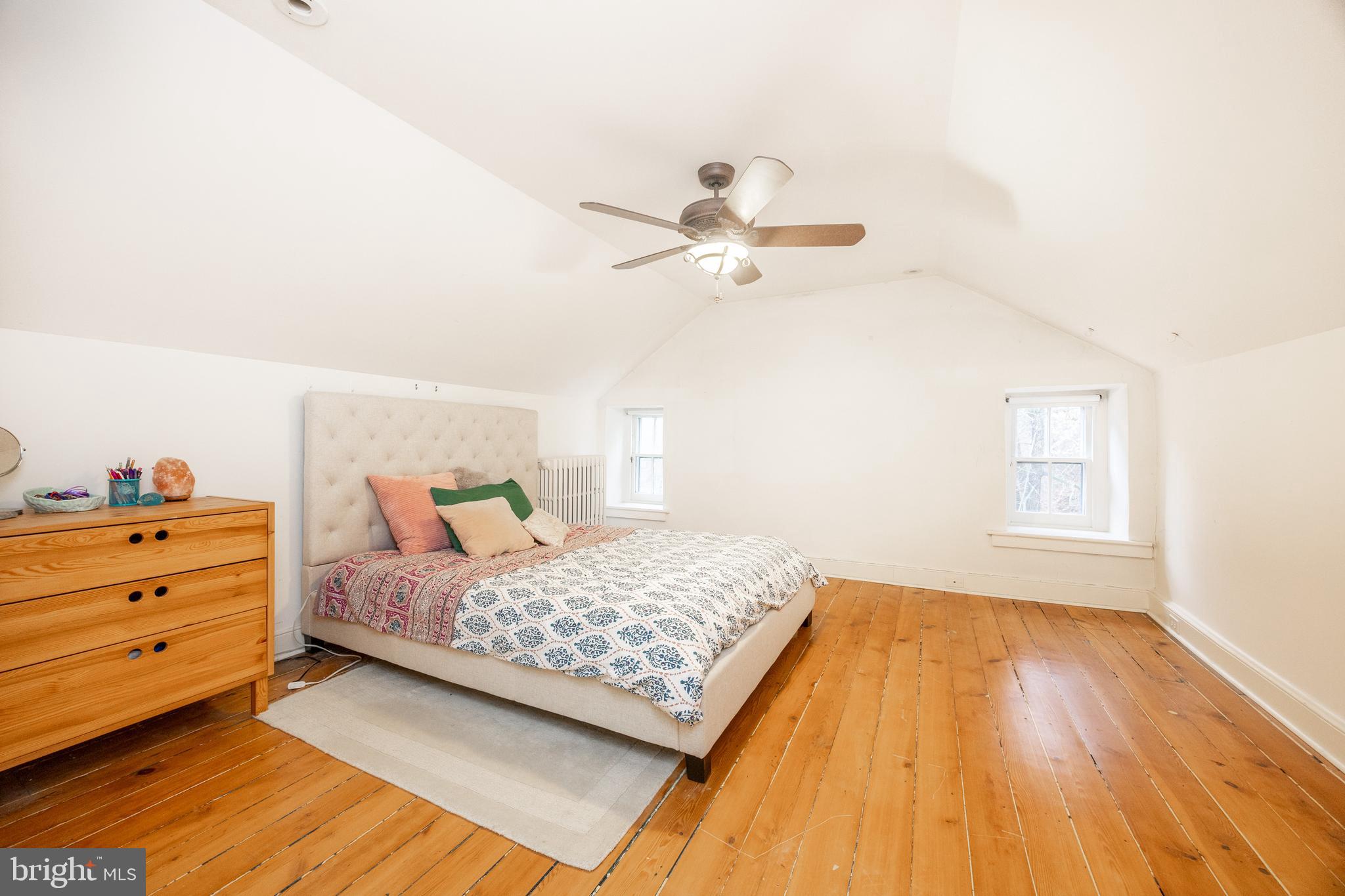 580 Reeds Road Downingtown, PA 19335 - Photo 30 of 82 a bedroom with a bed and a chandelier
