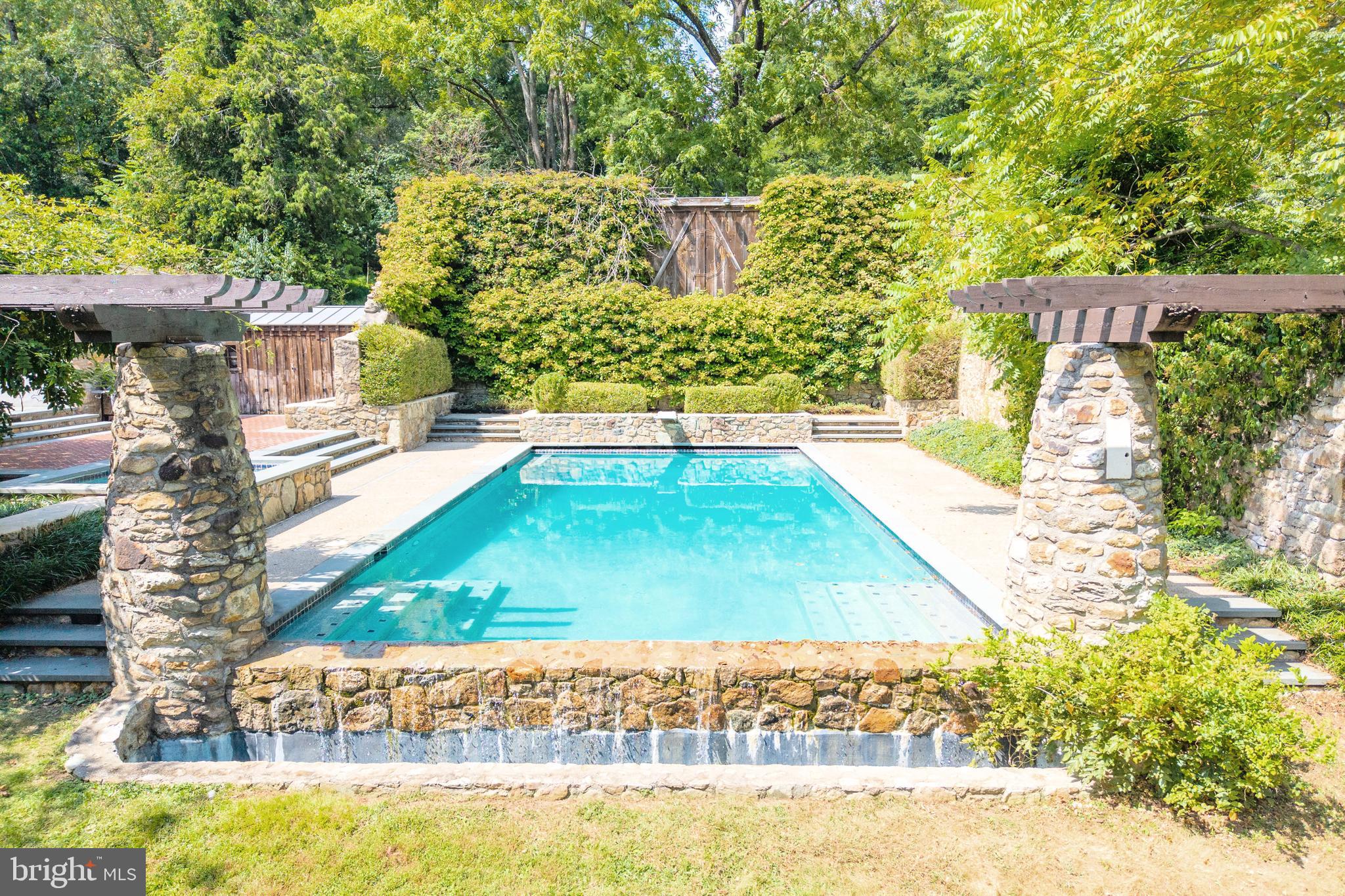 580 Reeds Road Downingtown, PA 19335 - Photo 4 of 82 a view of a swimming pool with a patio