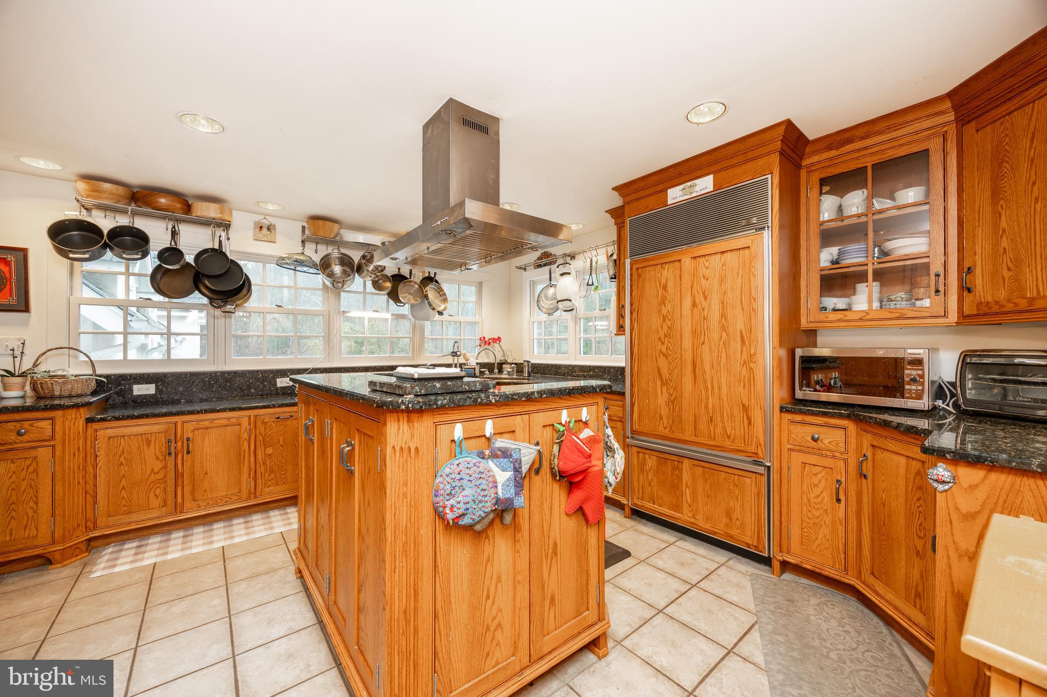 580 Reeds Road Downingtown, PA 19335 - Photo 41 of 82 a kitchen with stainless steel appliances granite countertop a refrigerator and a sink
