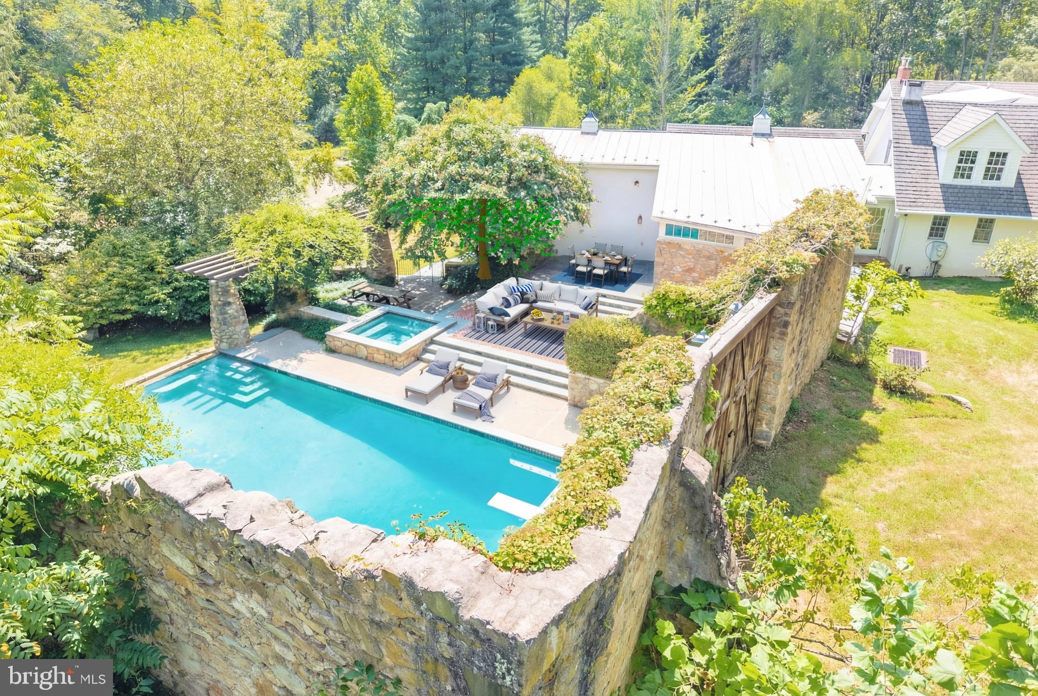 580 Reeds Road Downingtown, PA 19335 - Photo 5 of 82 Old barn facade is the stunning pool setting