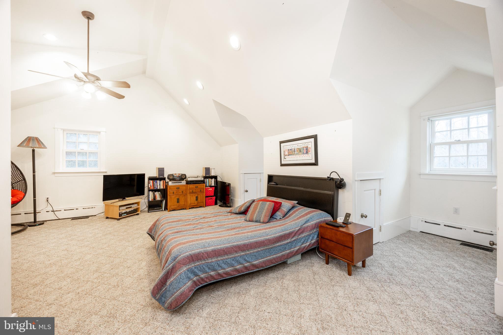 580 Reeds Road Downingtown, PA 19335 - Photo 55 of 82 a bedroom with furniture and a flat screen tv